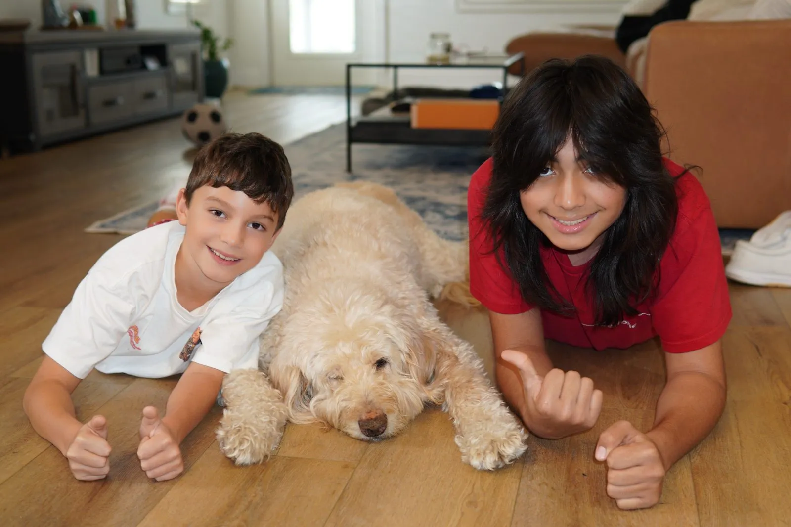 Two thumbs up from the boys, Charlie snoozing between them